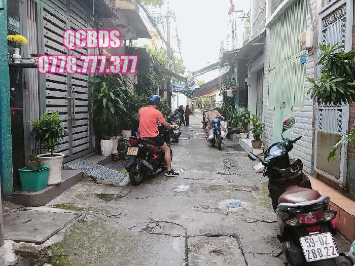 Bán nhà hẻm 595/35/26 CMT8 Quận 10 - 53 mét vuông 2 lầu 37 ban nha cmt8 quan 10 phong khach dai 20m.jpg